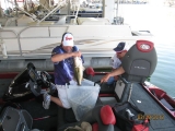 TBF of Michigan boater Marc Snyder sacks up a big largemouth bass