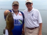 Dave Reault with a nice smallmouth bass with Michigan State Representative Tim Kelly