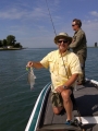 Senator Geoff Hansen shows a spinnerbait caught white bass