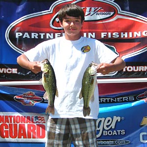 2012 TBF of Michigan 11 to 14 years old Jr state champion Matt Davis shows 2 Pontiac Lake bass from his winning limit of bass that weighed 9.82 pounds