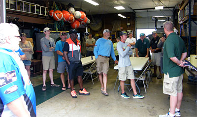 MDNR bass tournament liaison Tom Goniea presents information about the Michigan Fishing Tournament Information System to the MLSC bass fishing outing participants.